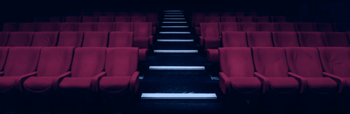 Rows of red cinema seats